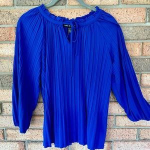 Ladies royal blue 3/4 length sleeve blouse.